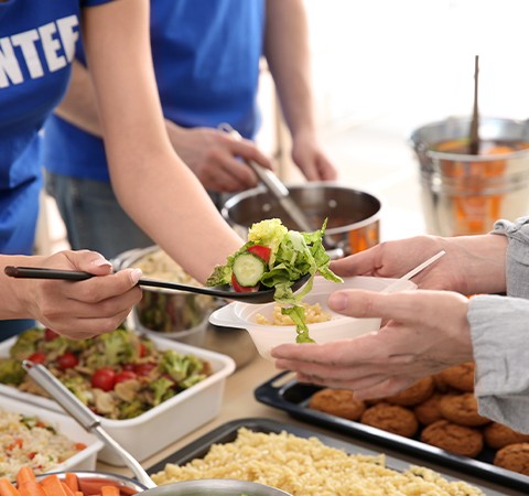 volunteers serving food 