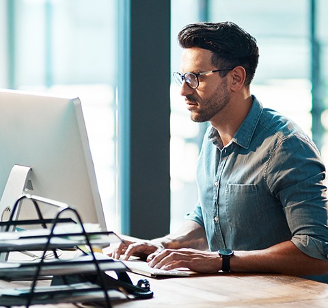 man working at computer