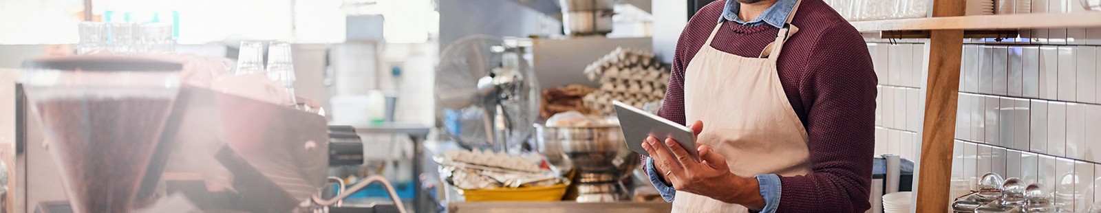 store worker on tablet