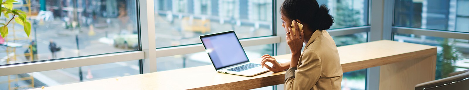 businesswoman on laptop and conference call