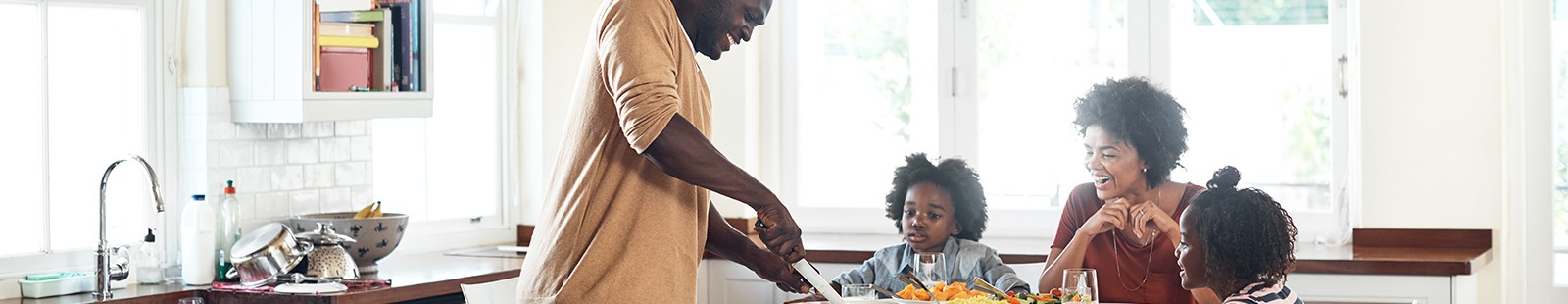 Father cooking for family