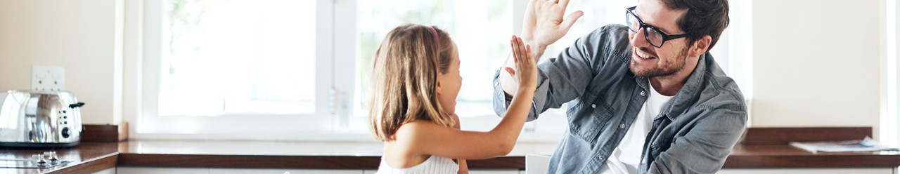 father daughter high fiving