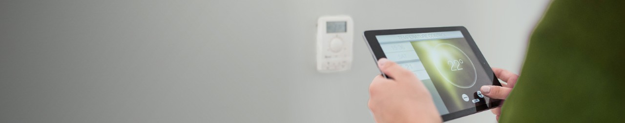 At home checking thermostat