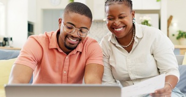 couple looking at a laptop