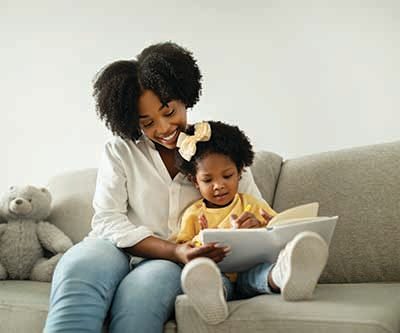 Mom and daughter reading